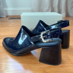 Navy blue patent leather sling backs. Size 41